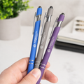 Summit Global Investments logo pens in hand — blue, gray, and purple